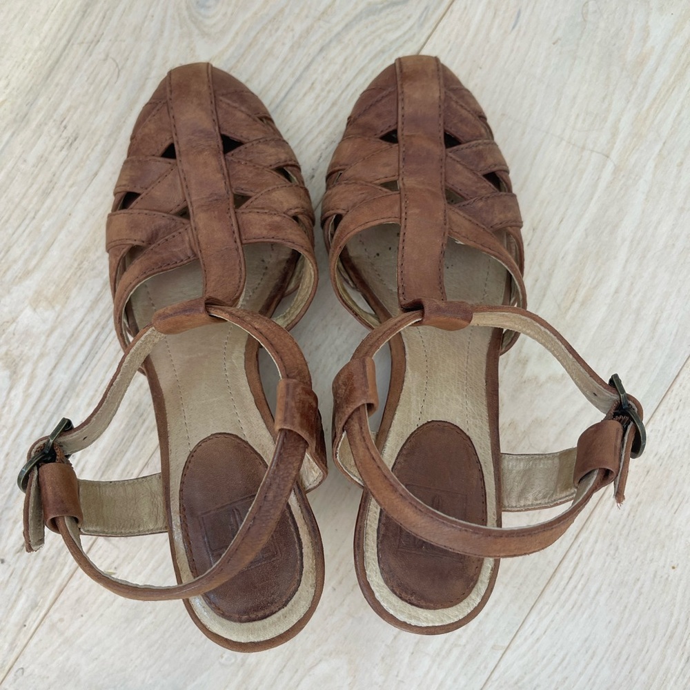 Frye size 7M brown leather wedges.  Good condition.